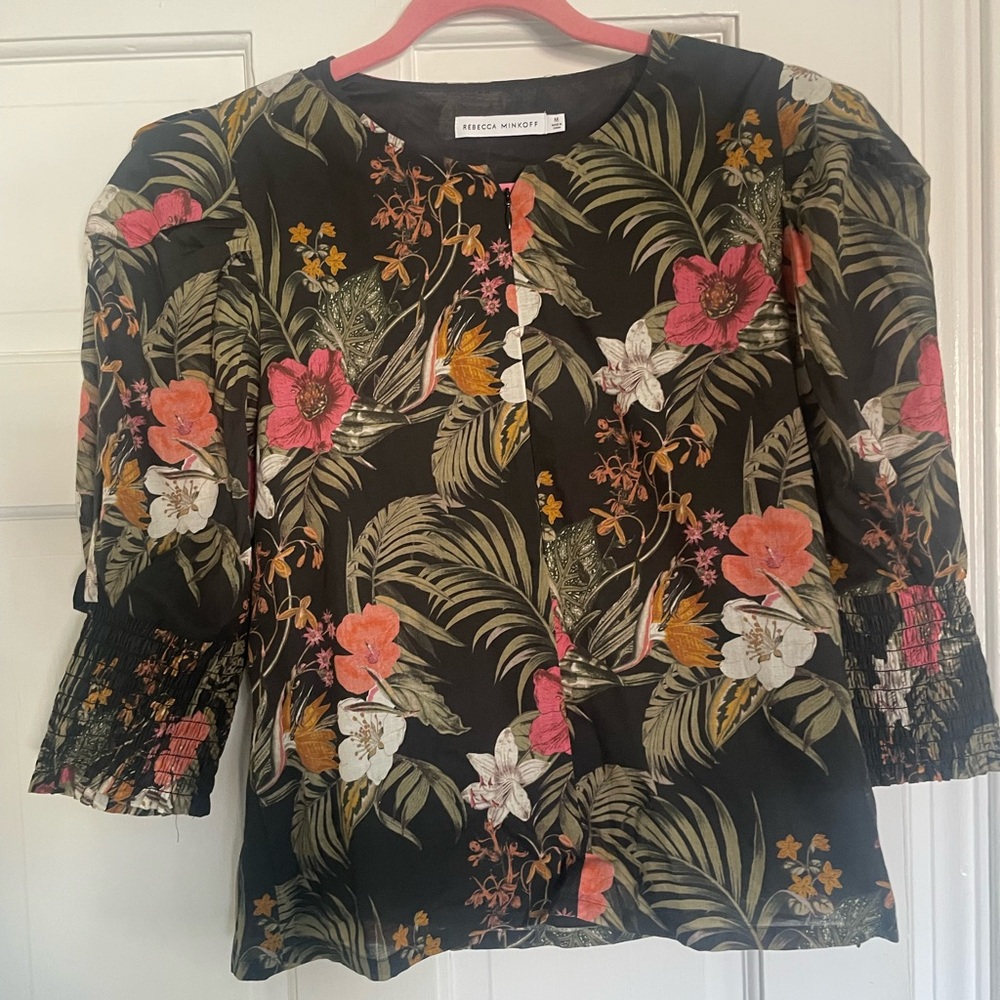 Rebecca Minkoff Black Floral Blouse
Never worn but no tags attached.